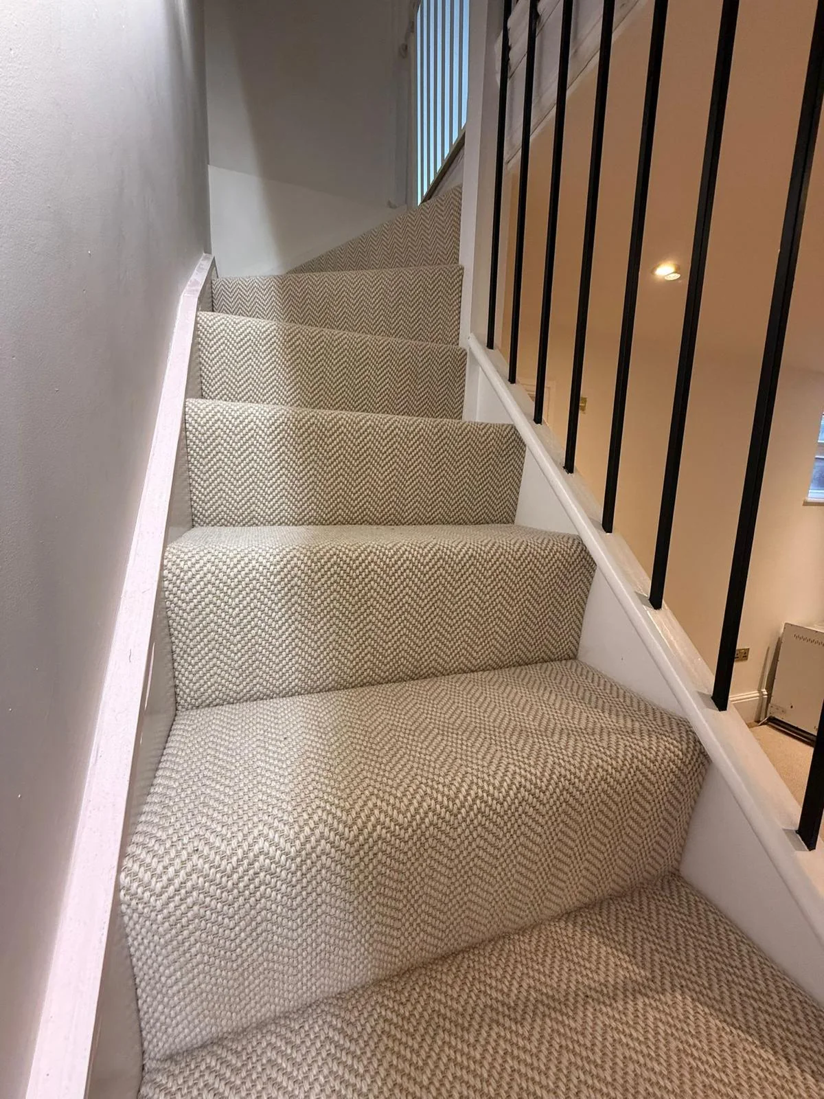 Textured carpet on a turning staircase